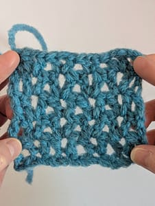 V stitch crochet pattern in blue yarn
