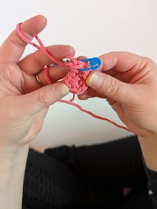 Stitch marker placed in the first stitch of the round of single crochet stitches