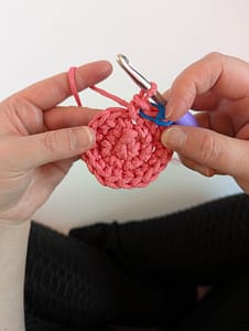 Three rounds of single crochet stitches worked in a circle