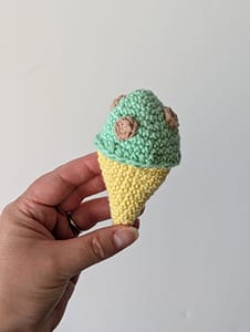 A 3D crochet Ice cream, in a cone with mint choc chip ice cream